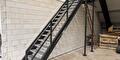 Industrietrap met bordes